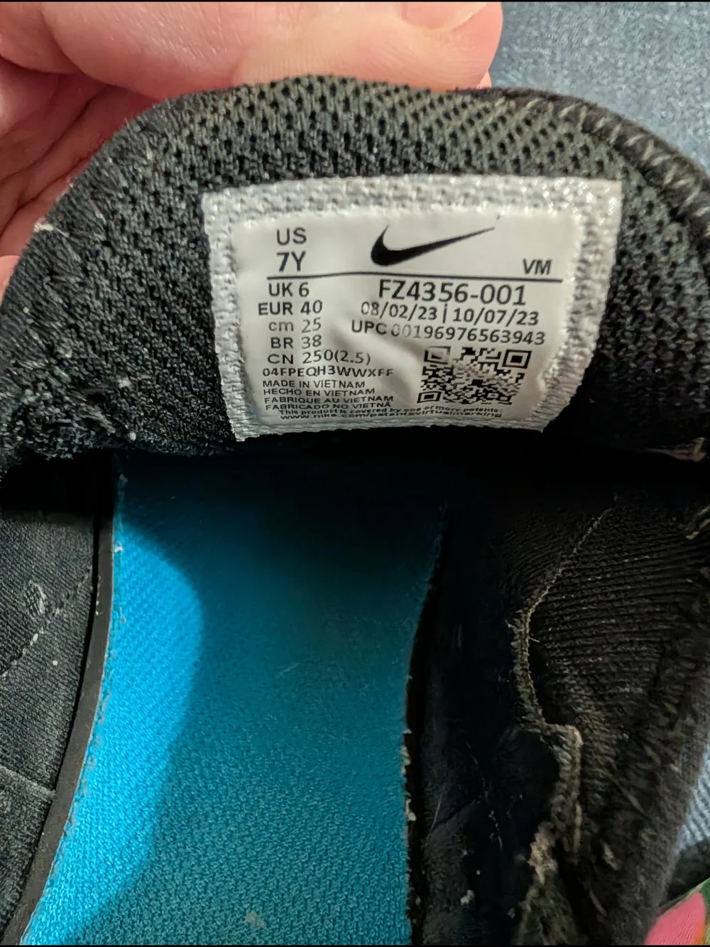 Nike Youth Black Sneakers with Bright Blue Insole